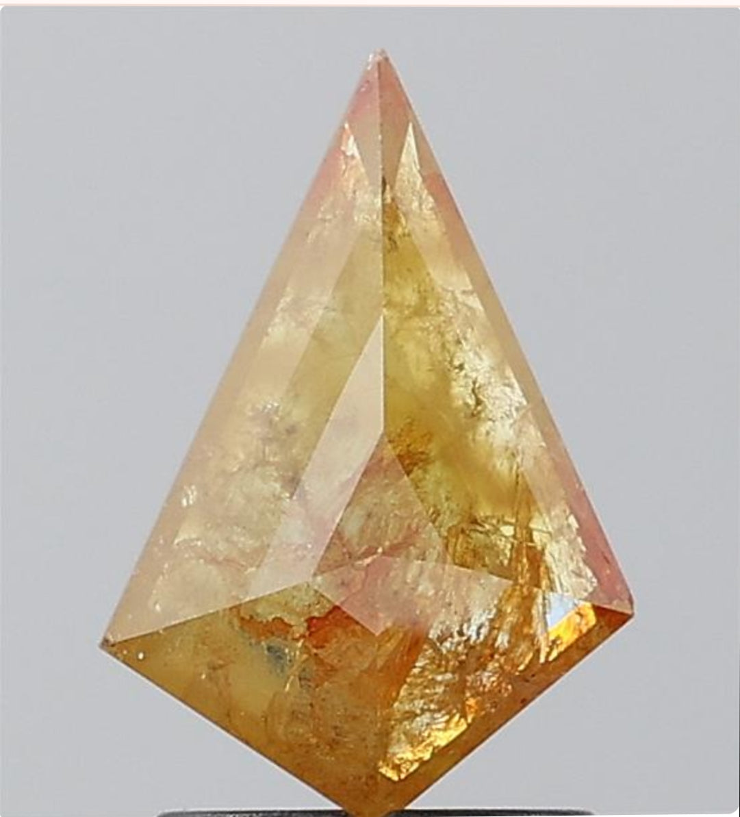 1.07 ct. Kite Step Cut Natural Yellow Colour Rustic Diamond Pair
