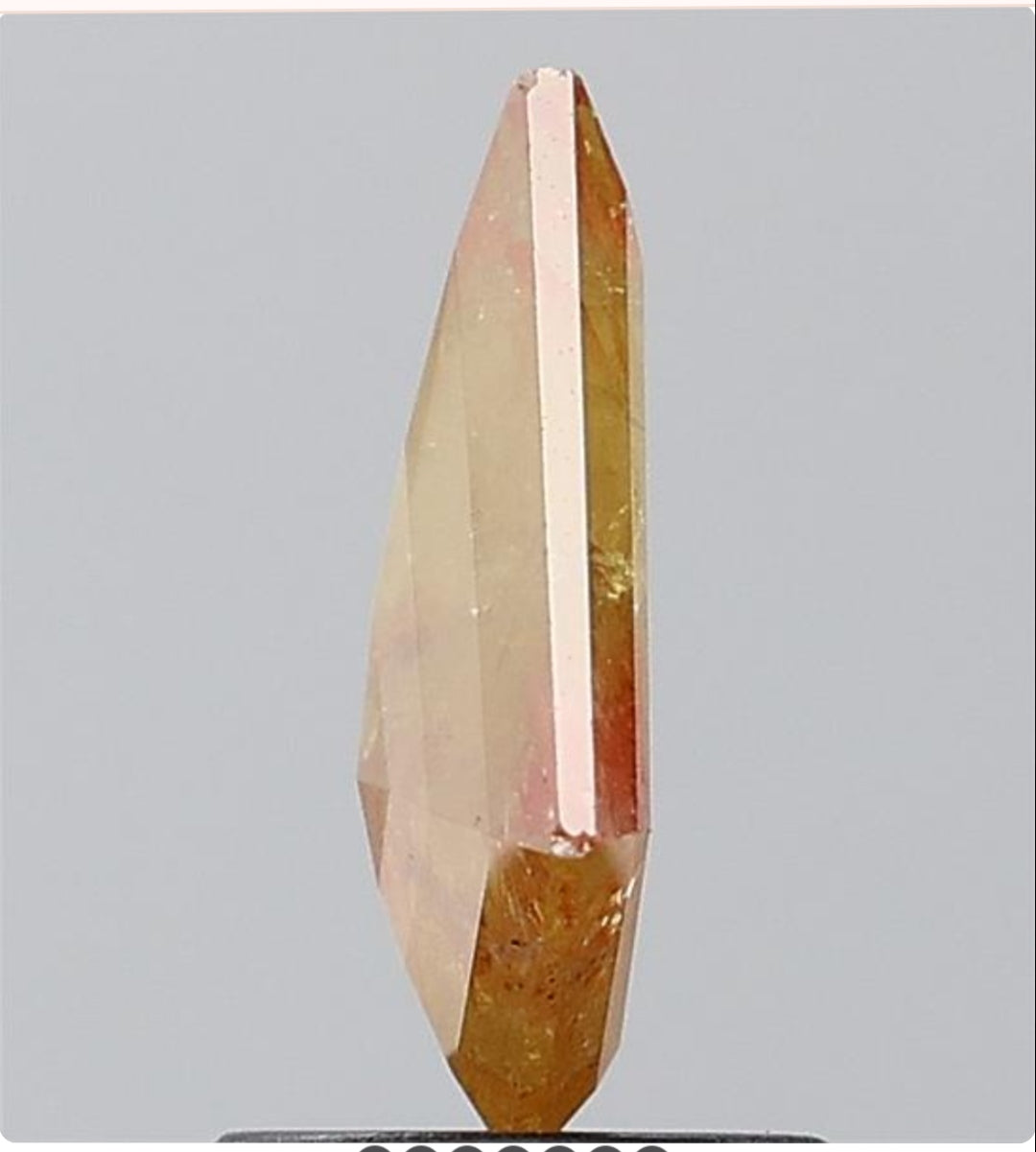 1.07 ct. Kite Step Cut Natural Yellow Colour Rustic Diamond Pair
