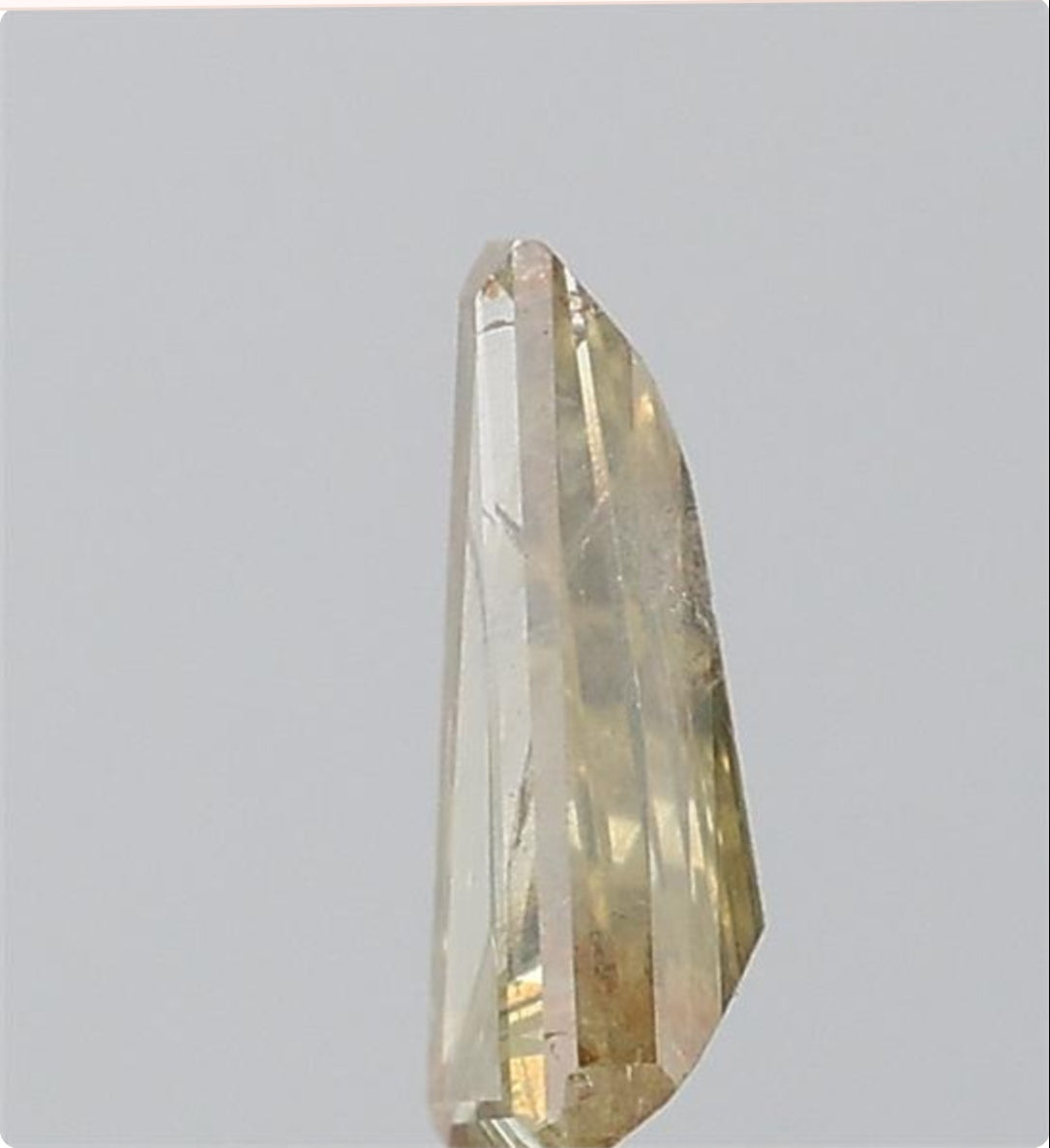 0.64 ct.Tapered Baguette Cut Natural Fancy Colour Diamond