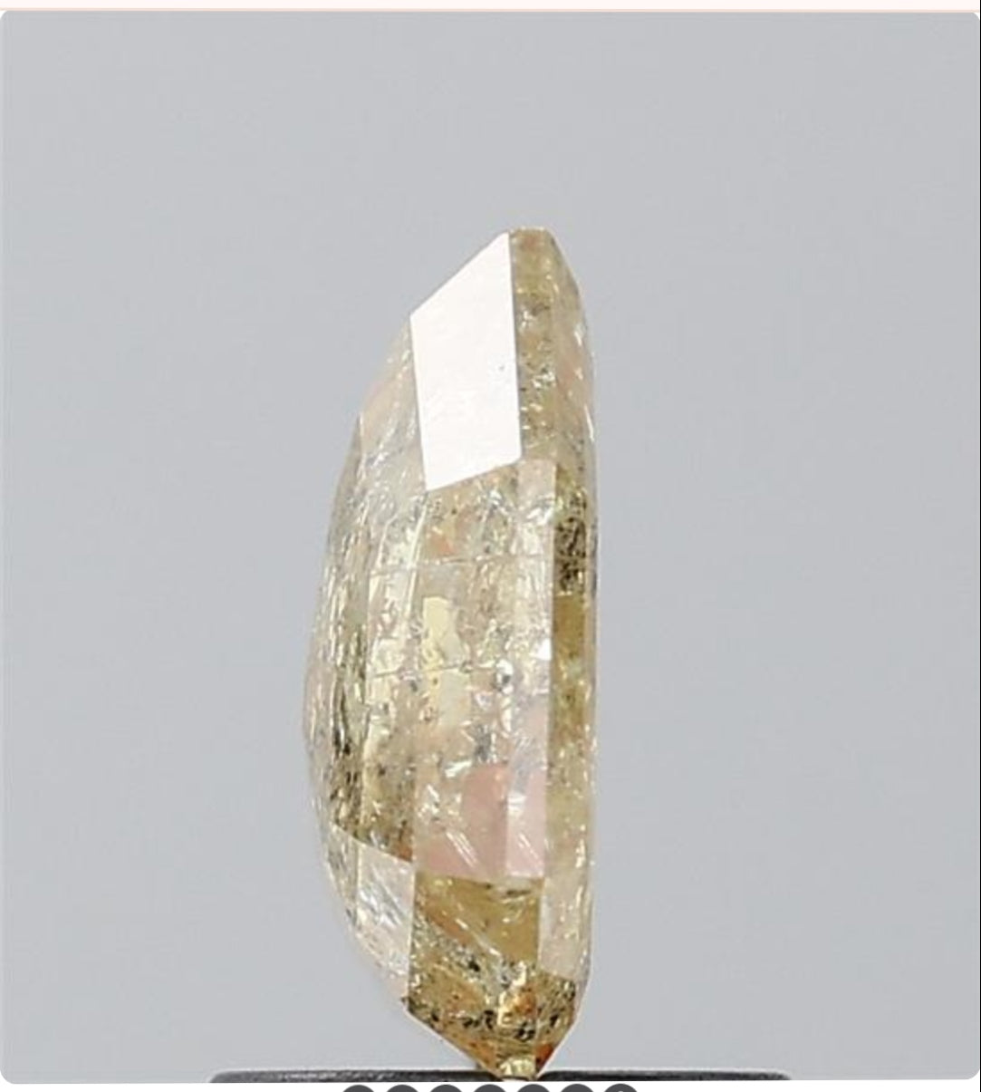 1.65 ct. Shield Stepcut Natural Fancy Yellow Colour Diamond